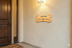 Friendly Pet Wall Decor | 12x6 Inches | Bone Shaped Wooden Sign | For Entrance/Living Room/Pet Area