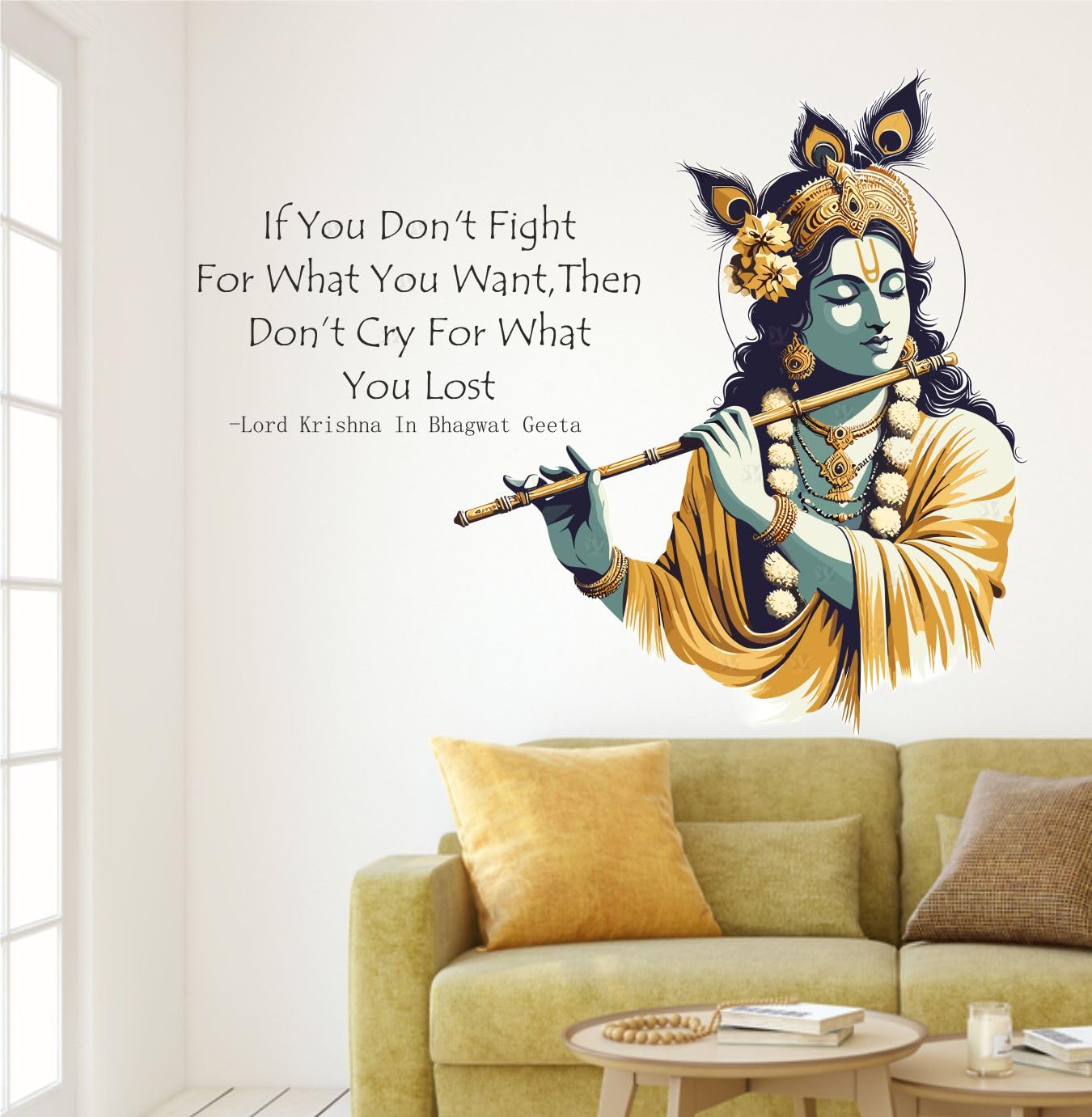 Wall decal of Lord Krishna playing a flute with a motivational quote on a wall above a couch.