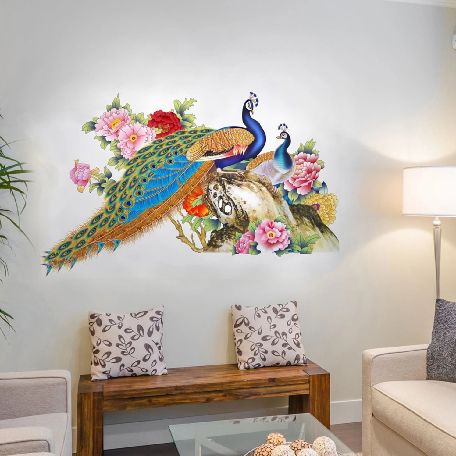 Decorative wall sticker of peacocks and flowers in a living room setting.