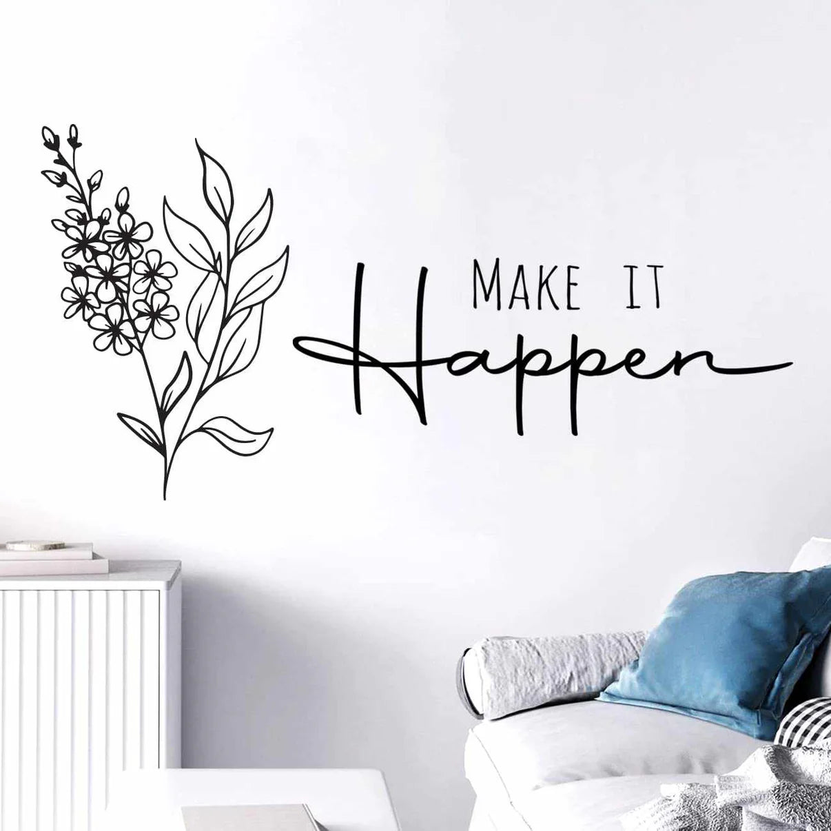 Decorative wall sticker with floral design and 'Make It Happen' text on a white wall.