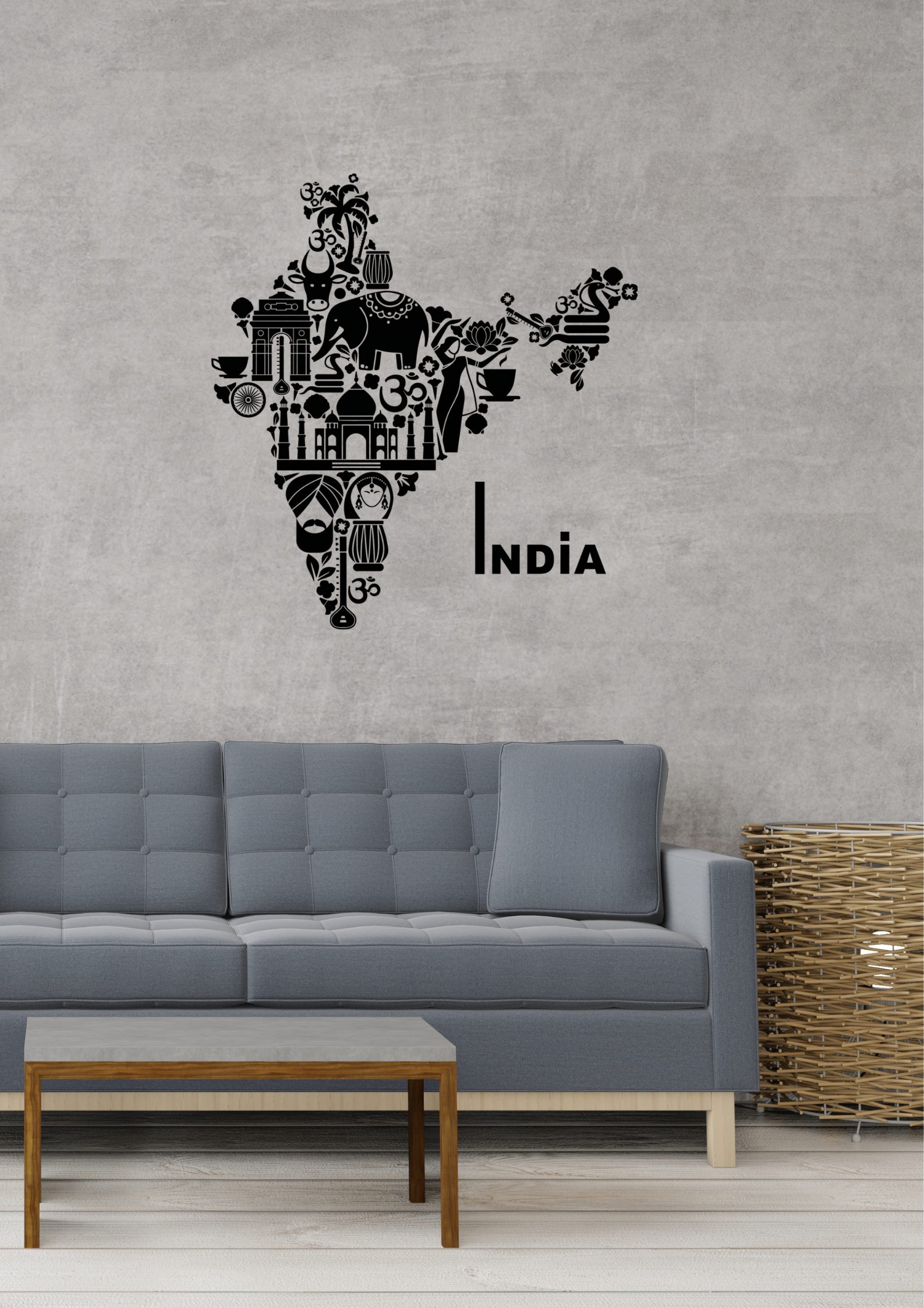 Wall decal of a map of India with cultural elements on a gray wall above a sofa.