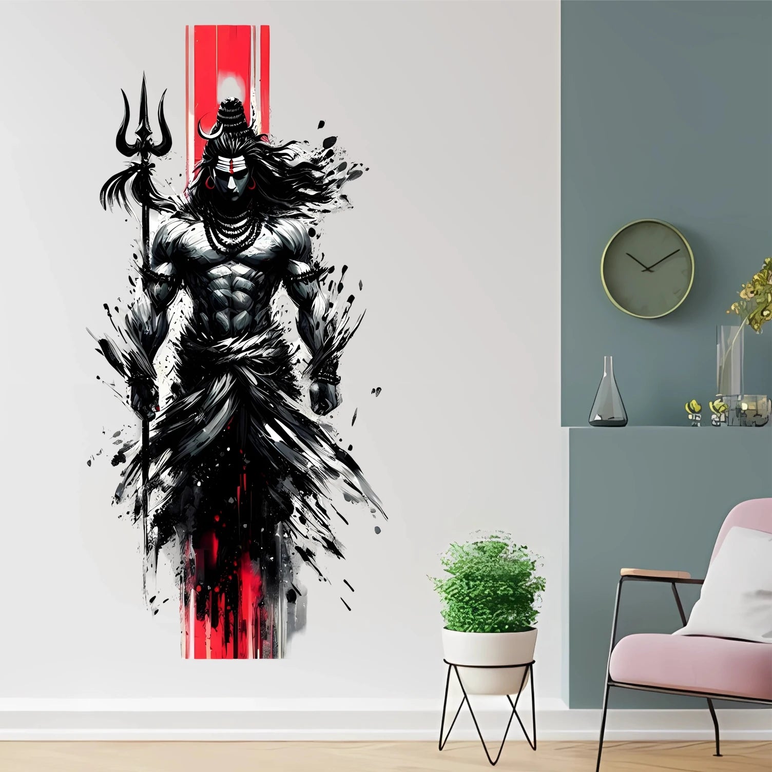 Wall decal of Shiva with a trident on a wall in a room with a chair and plant.