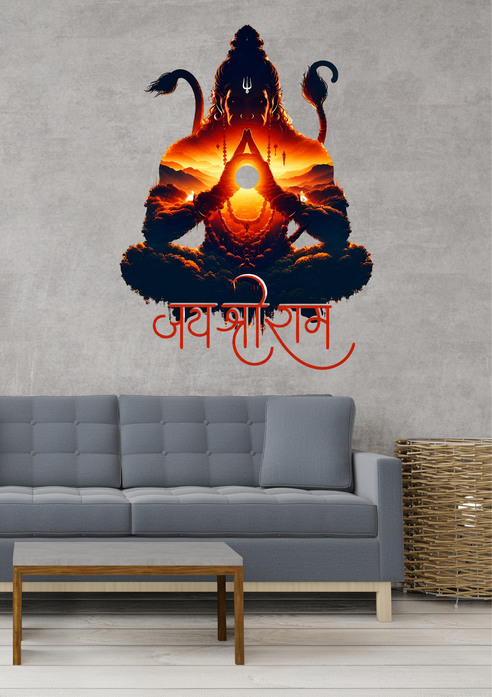 Wall decal of a Hanuman on a gray wall above a gray sofa.