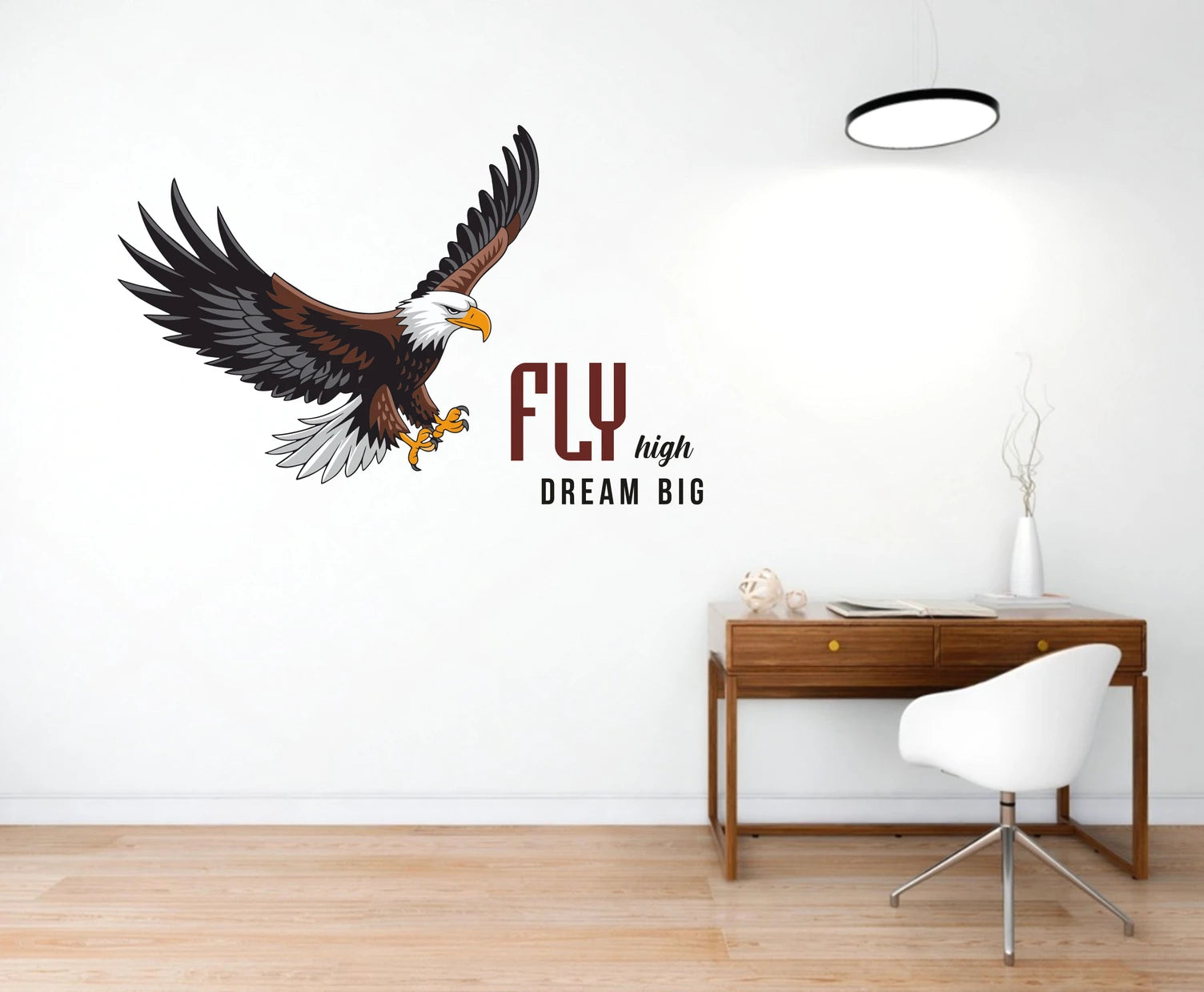 Wall decal of an eagle with 'Fly high Dream big' text in a room with a desk and chair.
