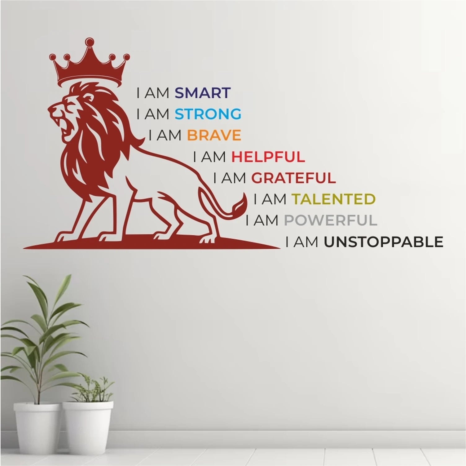 Wall decal of a lion with a crown and motivational phrases on a light gray wall.