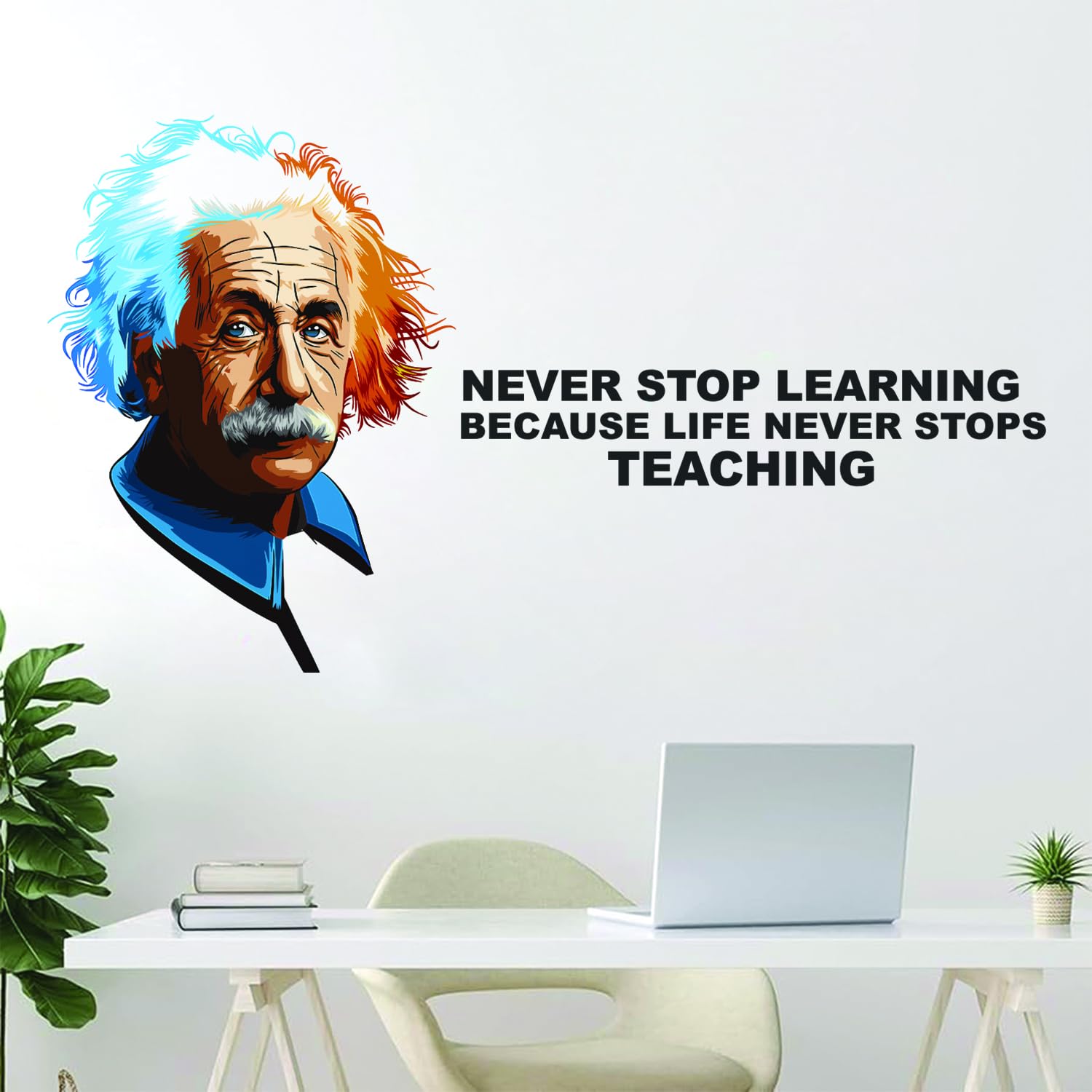 Decorative wall decal of Albert Einstein with a motivational quote in a home office setting.