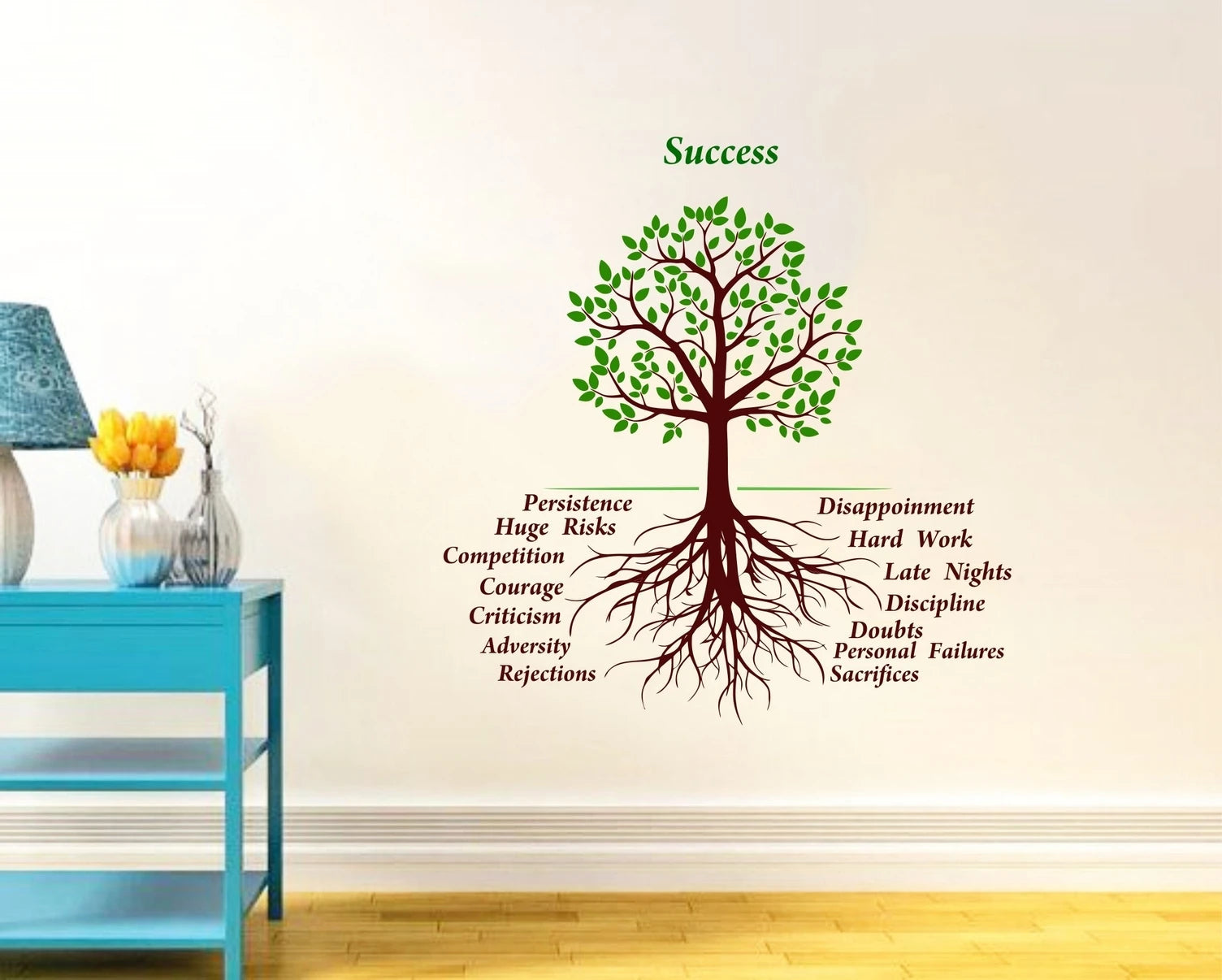 Wall decal of a tree with motivational phrases on a wall in a room with a blue shelf and lamp.