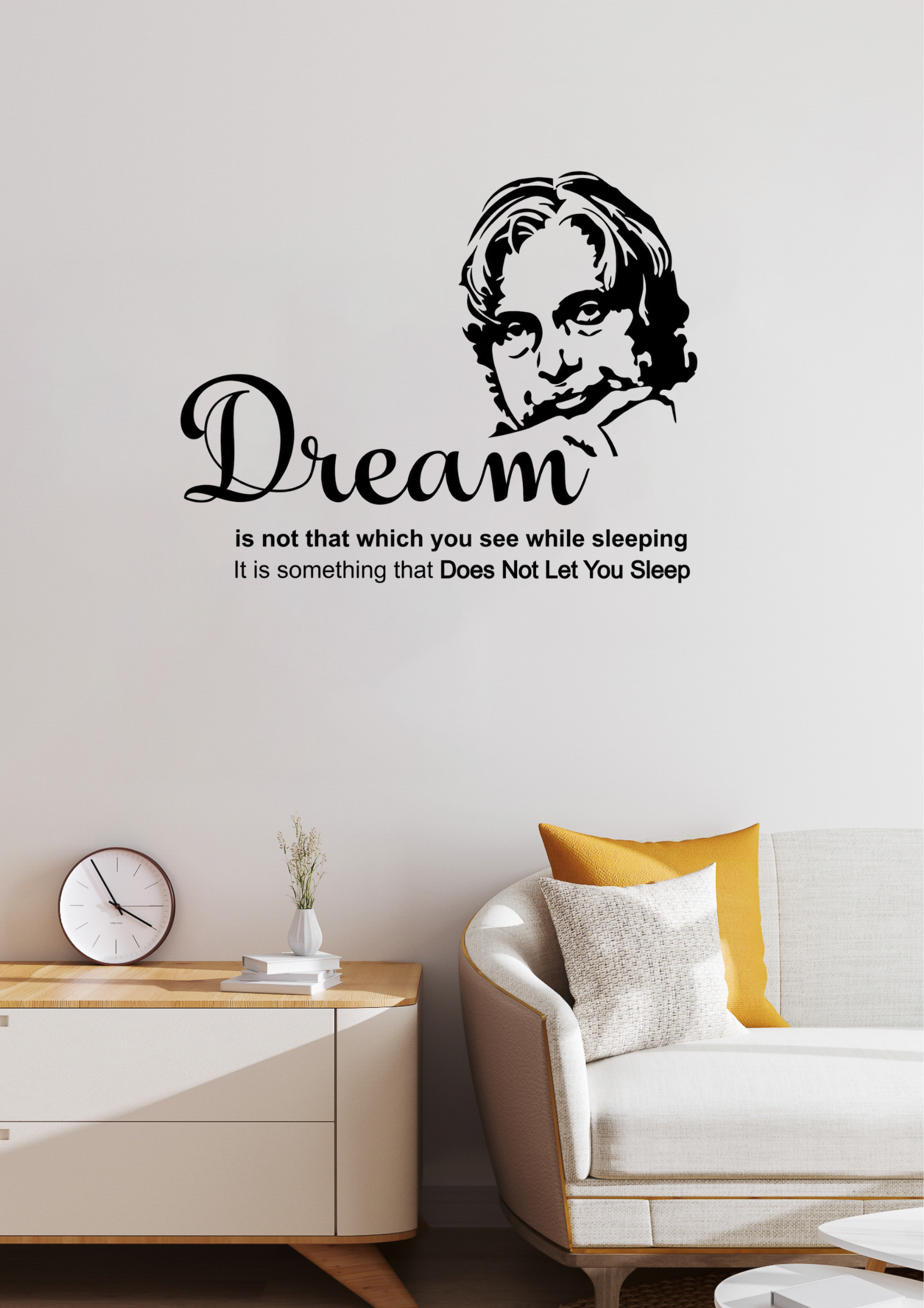 Wall decal with a quote and a silhouette of a Abdul Kalam in a living room setting.