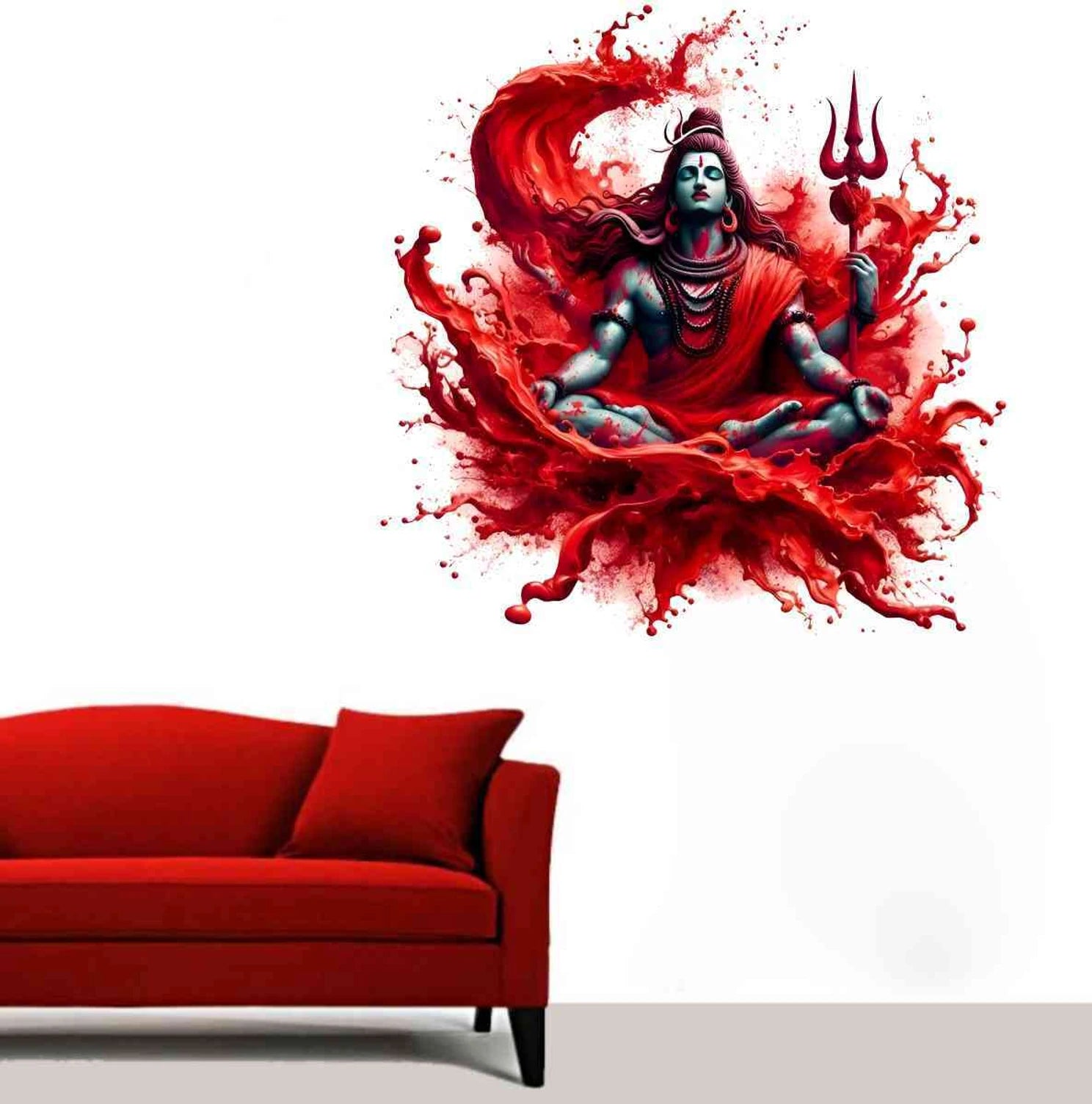 Wall decal of a Shiva surrounded by red smoke on a white wall above a red sofa.