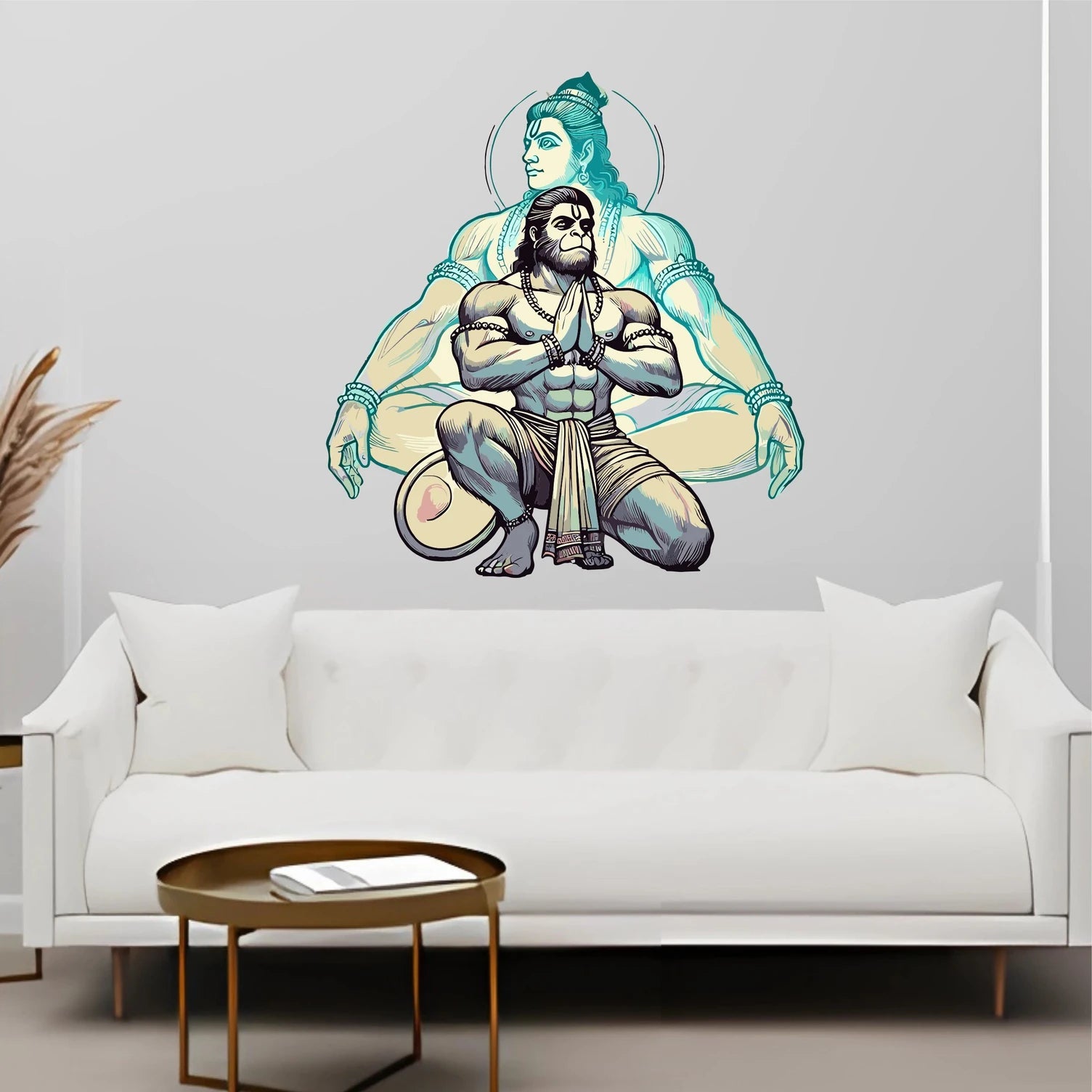 Wall decal of a Hanuman on a white wall above a white sofa.