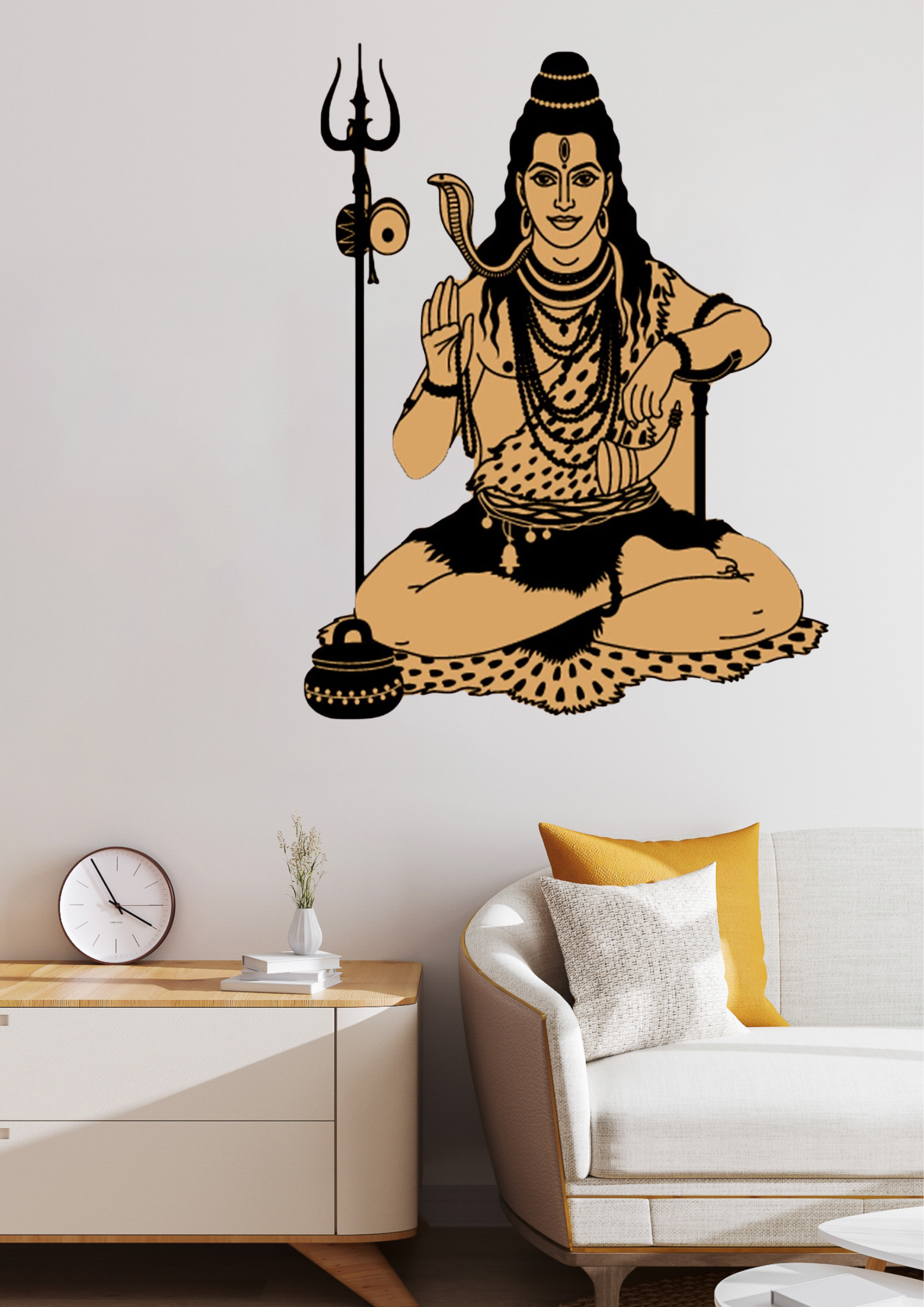 Wall decal of a seated Shiva with a trident on a wall in a living room.