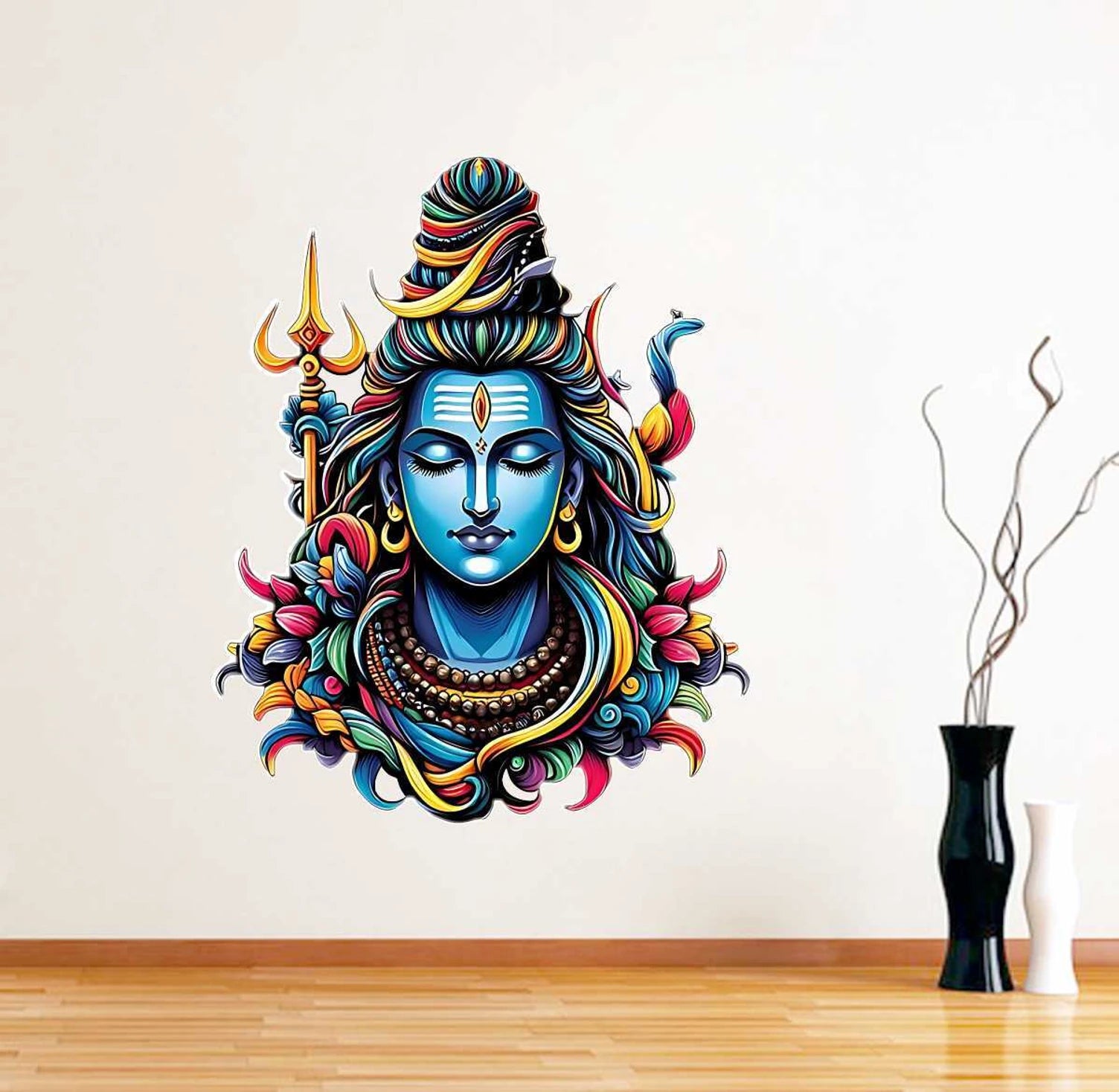 Colorful wall decal of Shiva on a white wall with a vase and branches in the foreground.