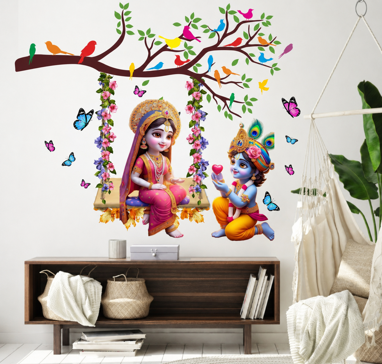 Wall decal of Radha Krishna on a swing with colorful birds and flowers, placed above a wooden cabinet.