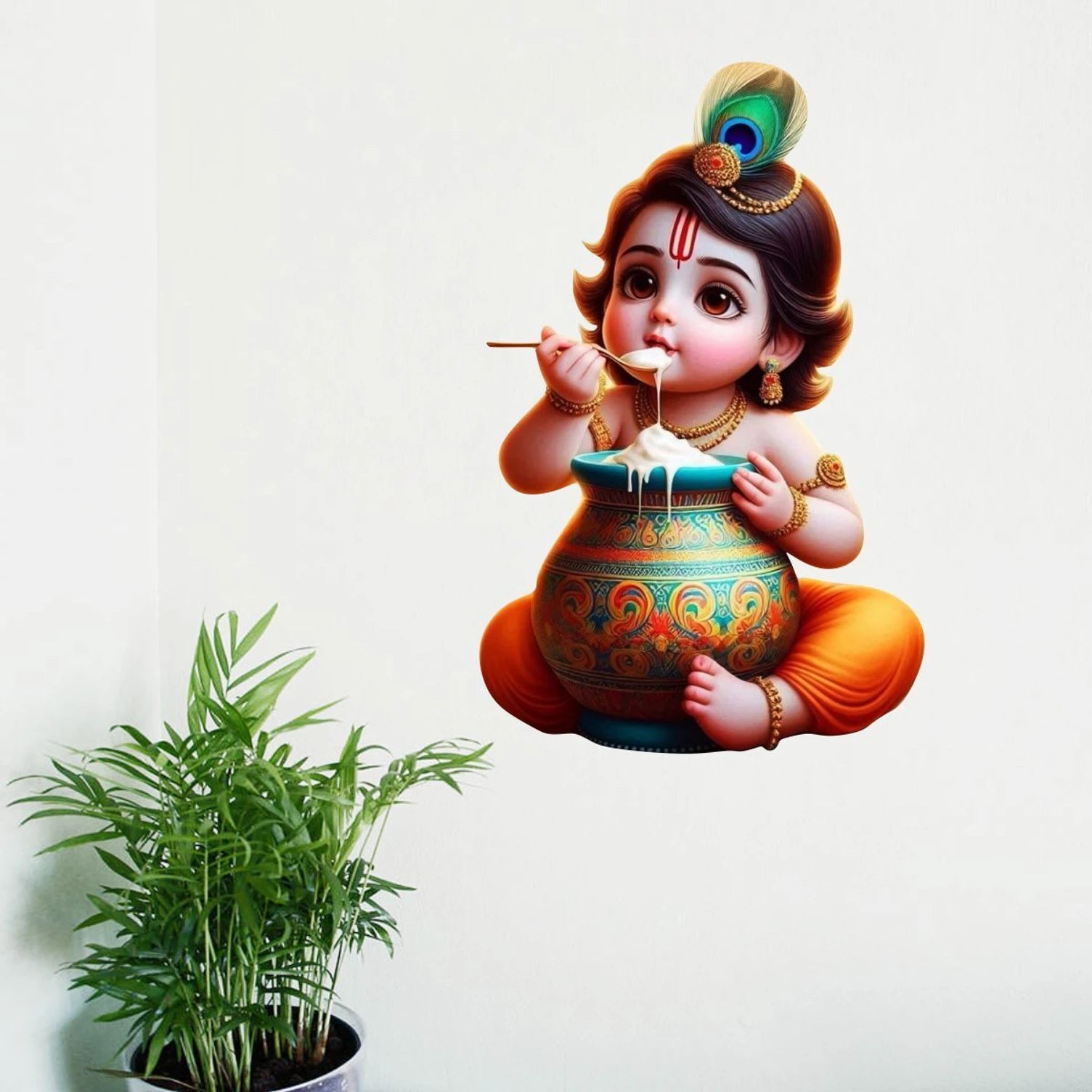 Colourful Bal Krishna Eating Makhan with a plant on a white background