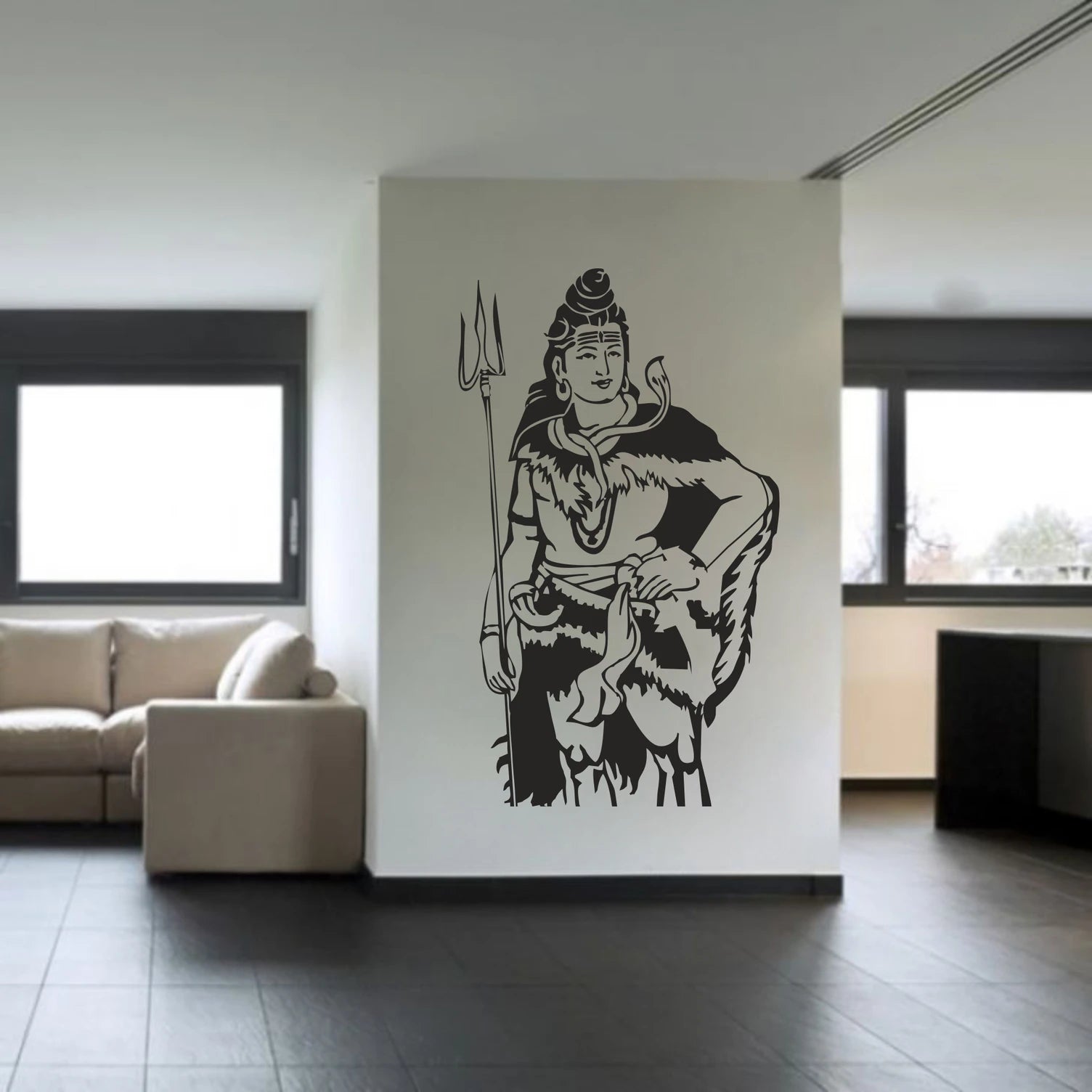 Wall decal of Shiva holding a trident in a modern living room.