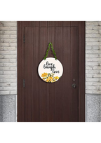 well being wall decor displayed on Main Door 